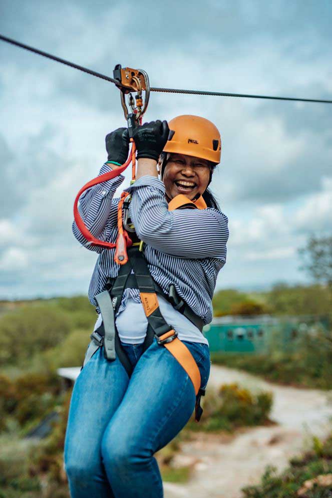 Lady completing the practice zip wires in the training zone before flying across the quarry